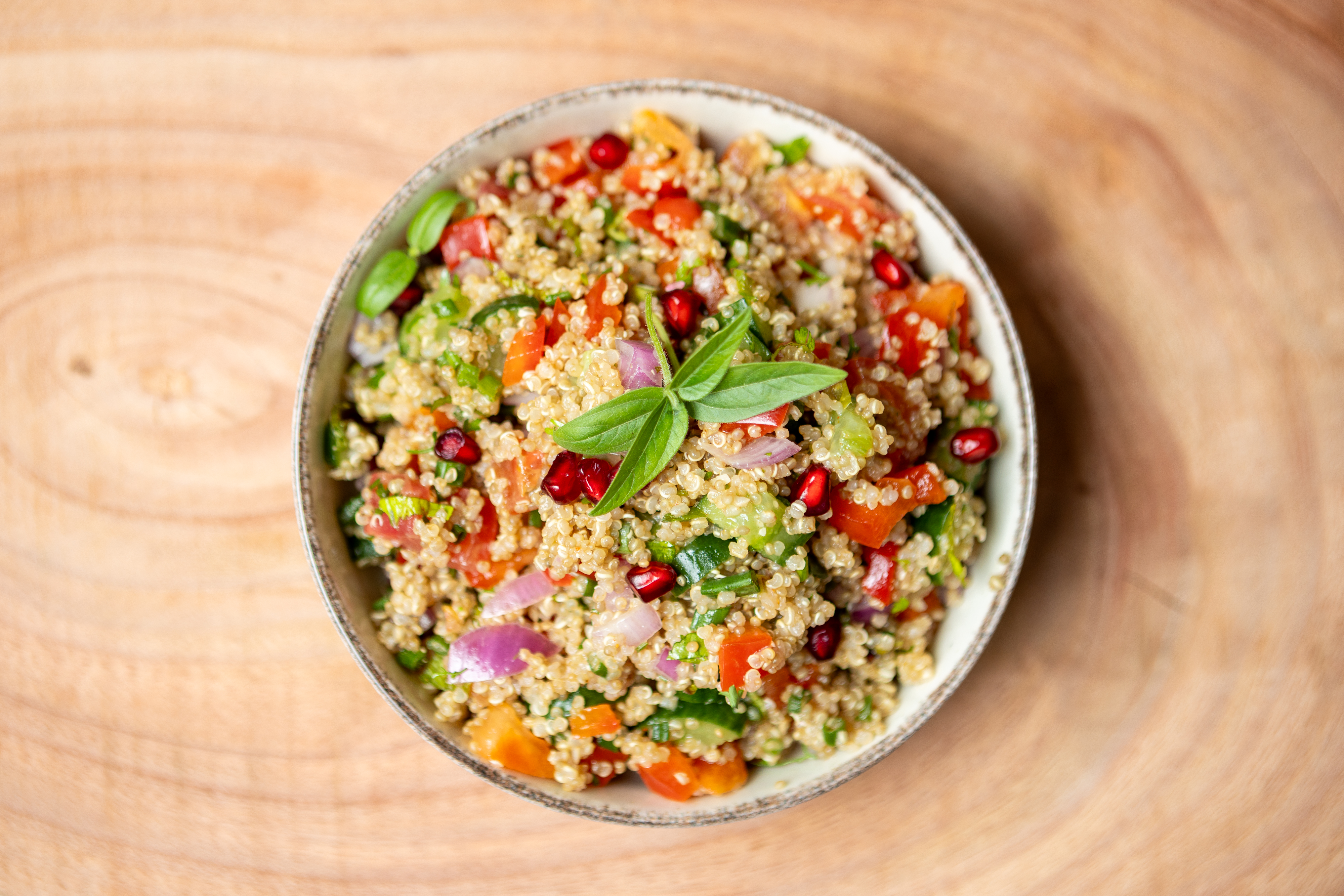 Quinoa salad with pomegranate and fresh basil